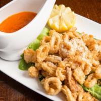 Calamari Fritti · Rings of calamari deep-fried and served with a spicy tomato sauce.