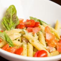 Penne Basilico · Vegetarian. Penne pasta served warm with olive oil and lemon juice, chopped fresh tomato and...