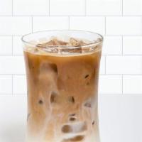Iced Latte · Rich shots of Espresso Dolce combined with cold milk and served over ice.