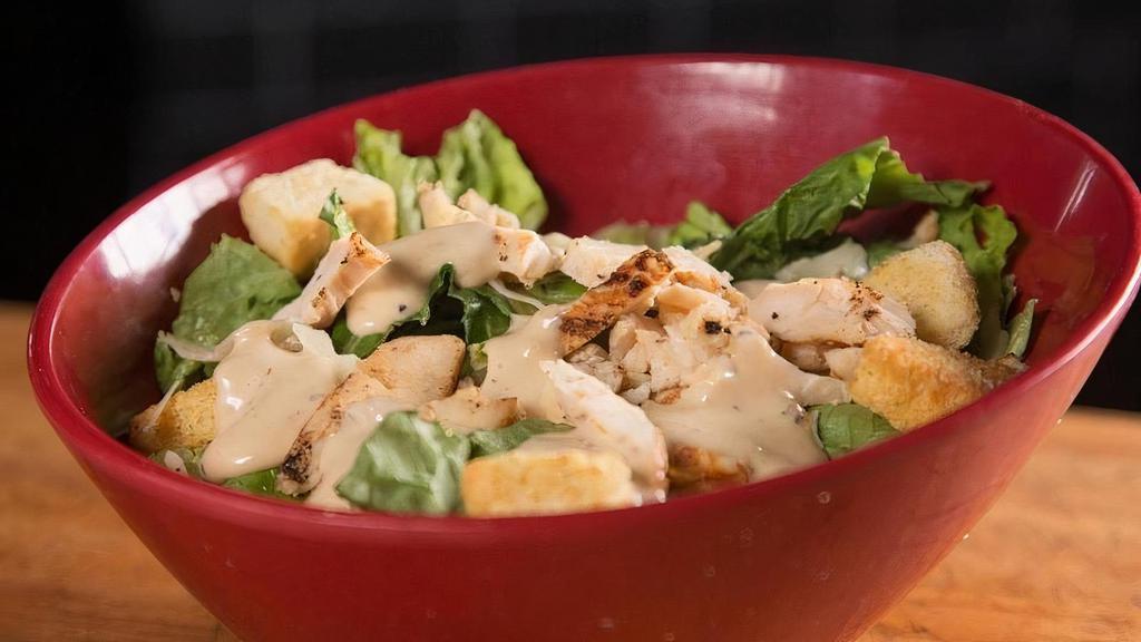 Caesar Salad · Romaine, Shaved Parmesan, Croutons, Grilled Chicken, and Caesar Dressing