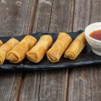 Fried Vegetarian Spring Rolls · Deep fried spring roll stuffed with carrots, cabbage and celery.