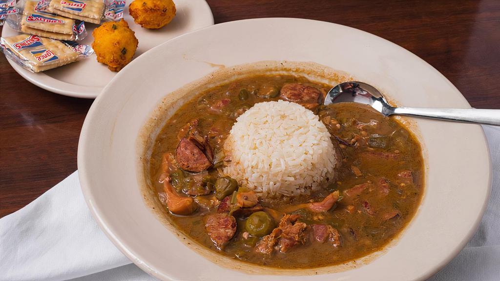 Togo Large Chicken/Sausage Gumbo · Bowl of Chicken and Andouille Sausage Gumbo. Add potato salad for $0.50