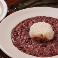 Togo Large Red Beans & Rice · Bowl of Red Beans, Andouille Sausage, Cajun herbs and Seasoning. Served over white rice.