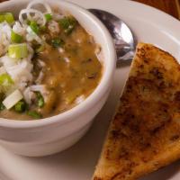 Togo Regular Crawfish Etouffee · Cup size of Crawfish Tails smothered in a homemade spicy Red Roux with Celery, Onions and Be...