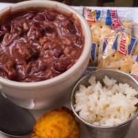 Togo Regular Red Beans & Rice · Cup of Red Beans, Andouille Sausage, Cajun herbs and Seasoning. Served over white rice.