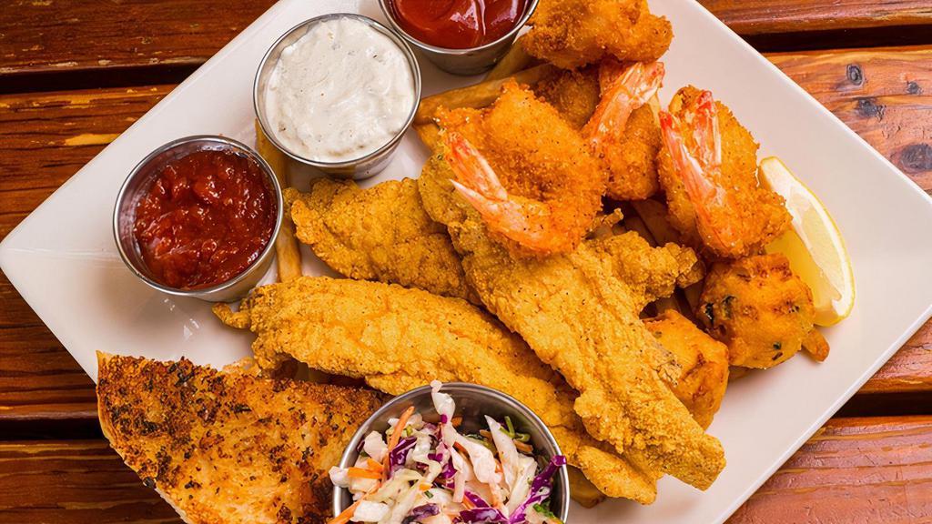 Togo Fried Shrimp & Catfish · Served with Fries, Hush Puppies, Cole Slaw and Garlic Bread.