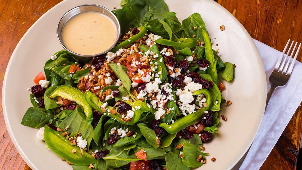 Togo Mad Hatter · Baby Leaf Spinach, Pecans, Dried Cranberries, Feta Cheese, Green Peppers, Onion, and Tomato. Served with Citrus Vinaigrette. Add Grilled Chicken for $3. Add Grilled Shrimp for $5.