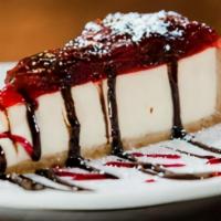 Strawberry Cheesecake · Creamy New York-style cheesecake topped with strawberry puree.