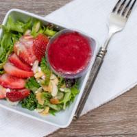 Coco'S House Salad · Contain nuts. Baby greens, toasted almonds, strawberries, goat cheese crumbles, peppery rasp...