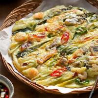 Seafood Pancake · Korean-Style pancake with squid, oyster, mussel, shrimp and green onion