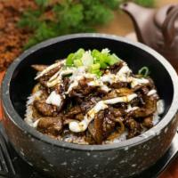 Beef Bulgogi Bowl · Thin slices of marinated beef is tender and juicy seeping with mildly sweet, savory, smoky f...