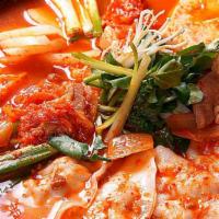 Kimchi Hot Pot · Ingredients: Homemade kimchi base, pork, dumpling(4pc) and rice cake with assorted vegetables