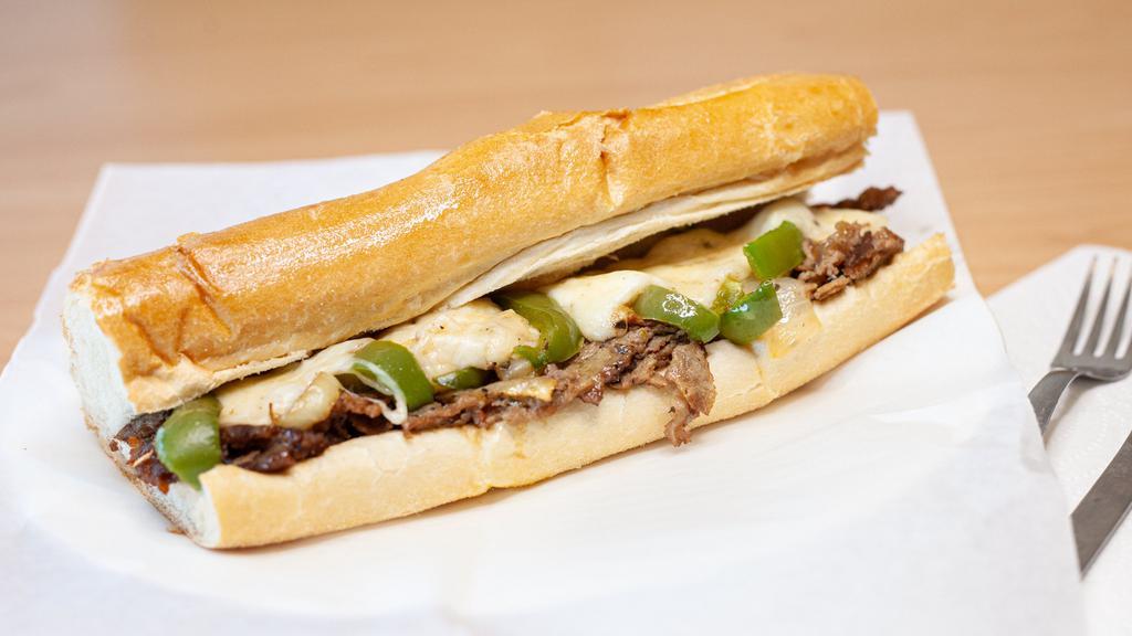 Philly Cheese Steak · Steak, grilled onions, bell peppers and melted cheese.