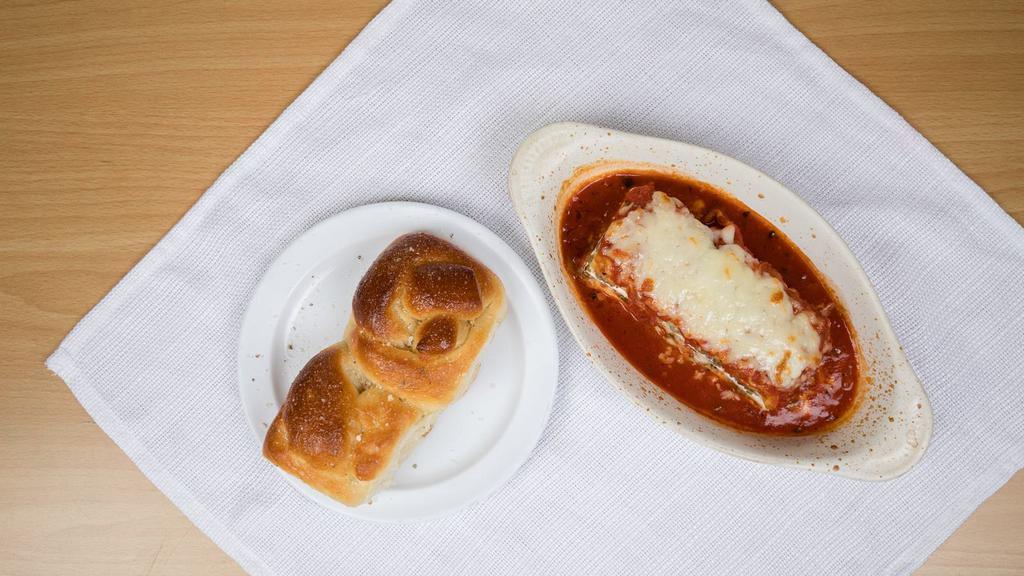 Lasagna · With tomato sauce.