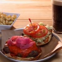 Buffalo Burger · Ground buffalo, roasted red pepper sauce, and pickled onions.