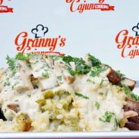 The Big Cheazzy · Cajun Seasoned and Smoked Turkey Leg stuffed with Brocolli and Cheese, Topped with Grilled C...