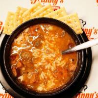 Gumbo (Lg) · Flavorful Roux based Gumbo with Crabmeat, Chicken, and Sausage served over Rice. Crackers in...