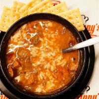 Gumbo (Sm) · Flavorful Roux based Gumbo with Crabmeat, Chicken, and Sausage served over Rice. Crackers in...