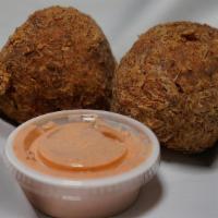 Boudin Balls (2) · Combination of Chicken, Pork, and Rice. Seasoned with a Cajun Blend of Spices. Battered and ...