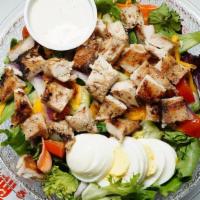 Granny'S Tossed Salads W/Fried Chicken · Spring Mix topped with Tomato, Cheese, Bacon, Boiled Egg and your choice of dressing. Topped...