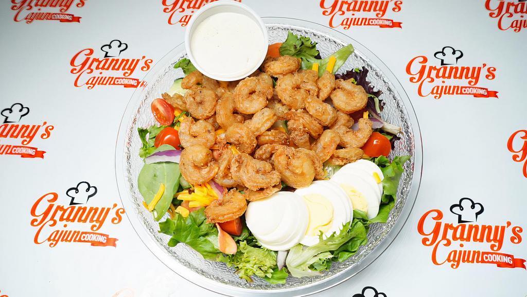 Granny'S Tossed Salads W/Grilled Shrimp · Spring Mix topped with Tomato, Cheese, Bacon, Boiled Egg and your choice of dressing. Topped with Shrimp