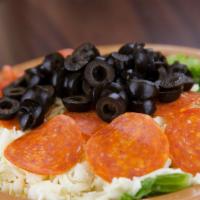 Italian Salad · Lettuce, tomato, black olives, pepperoni, and mozzarella cheese.