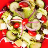 Greek Salad · Romanian lettuce, kalamata olive, feta cheese, cherry tomato, red onions, and cucumber serve...