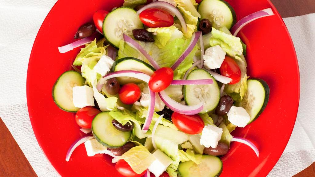 Greek Salad · Romanian lettuce, kalamata olive, feta cheese,cherry tomato, red onions and cucumber served with greek dressing or italian vinaigrette.