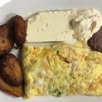Omelette · Eggs(3), Beans, Plantains, Salvadorean Cheese, Salvadorean Sourcream, hand made Tortillas(2)