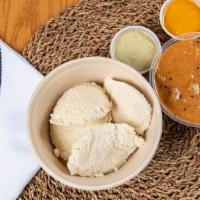 Idli Sambar · Steamed rice cake made from rice and lentils.