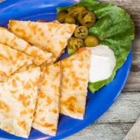 Quesadilla · Flour tortillas with Monterey Jack cheese, pico de gallo, peppers, sour cream, and pickled j...