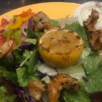 Shrimp Salad · Mesquite grilled shrimp served over mixed greens, tomatoes, sweet peppers, red onions, and a...