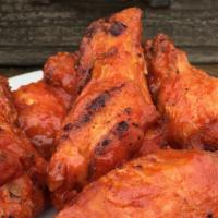 Scholzhaus Smoked Wings · 6 slow smoked wings. Choice of Buffalo, BBQ, Haus Dry Rub or Lemon Pepper and choice of ranc...