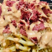 Reuben Waffle Fries · Crispy waffle fries smothered in melted swiss cheese, sauerkraut, corned beef and Thousand i...