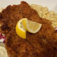Wienerschitzel · Tender, thin sliced veal, pretzel breaded and pan seared. Served with lemon caper aioli, rot...