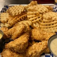 Scholz Fried Chicken Tenders · Boneless battered and fried chicken tenders, waffle fries and a side of pepper cream gravy &...