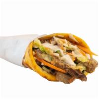 Yummy Shawarma Section · Naan, hummus, tahini, white yogurt sauce, lettuce, cucumber, carrot, and cabbage mix.