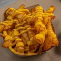 Cheese Fries · Crinkle fries with whiz cheese