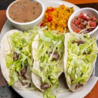 Beef · Three fajita beef soft tacos with lettuce. Served with rice, beans, and pico.