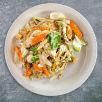 Yankee Noodle Dandy · Clear glass noodles stir-fried with yellow onion, scallions, napa cabbage, celery, and tomato.