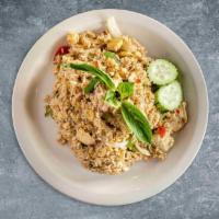 Behind These Basil Eyes · Stir-fried rice with egg, broccoli, bell pepper, basil, yellow onion, and tomato.