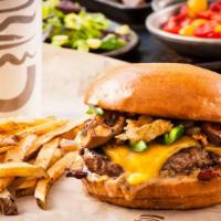 Dugg Burger · We dig out the top portion of the bun and fill it with any toppings you choose. All toppings...