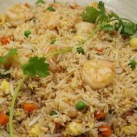 Shrimp Fried Rice · White rice stir-fried in soy sauce with eggs, green peas, carrots, bean sprouts, and shrimps.
