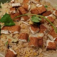 Tofu Fried Rice · White rice stir-fried in soy sauce with eggs, carrots, peas, bean sprouts, mushrooms, cabbag...