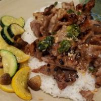 Rice Platter Grilled Pork · Honey glazed pork with sauteed yellow squash, zucchini, mushrooms and side of house sauce. S...