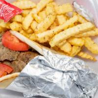 Lamb Kabob Wrap · With tahini sauce, tomatoes and pickles. Add french fries for an additional price.