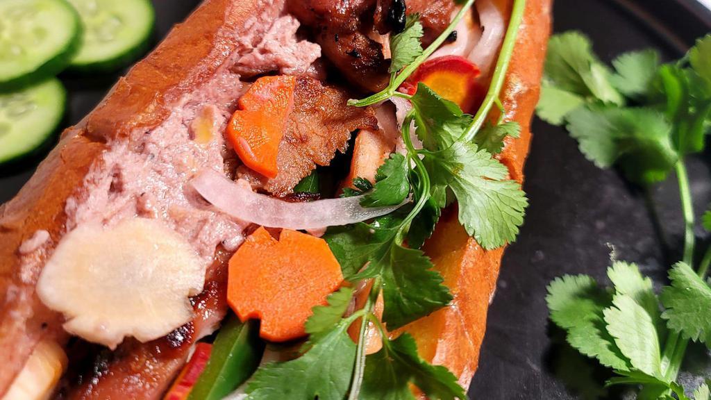 Bag(Uette) For Me Banh Mi (Banh Mi Viet Nam) · Vietnamese style sandwich (banh mi) filled with homemade pate, cucumber, cilantro and pickled veggies with your choice of protein