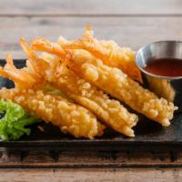 Shrimp Tempura · Battered deep fried shrimp served with sweet and sour sauce.