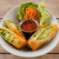 Crispy Avocado Spring Roll · Avocado, pickled carrots and daikon, served with sweet chili sauce.
