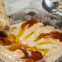 Hummus · An Egyptian food dip or spread made from cooked, mashed chickpeas, blended with tahini, oliv...